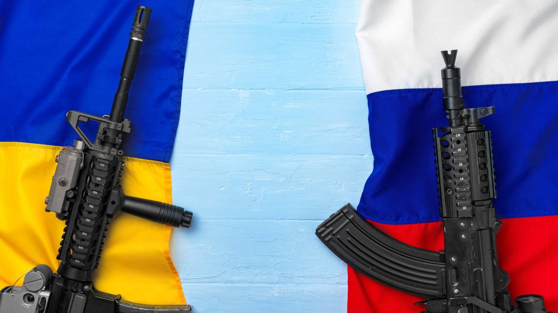 flags-of-russia-and-ukraine-with-weapon-rifles-2021-09-03-14-38-03-utc.jpg