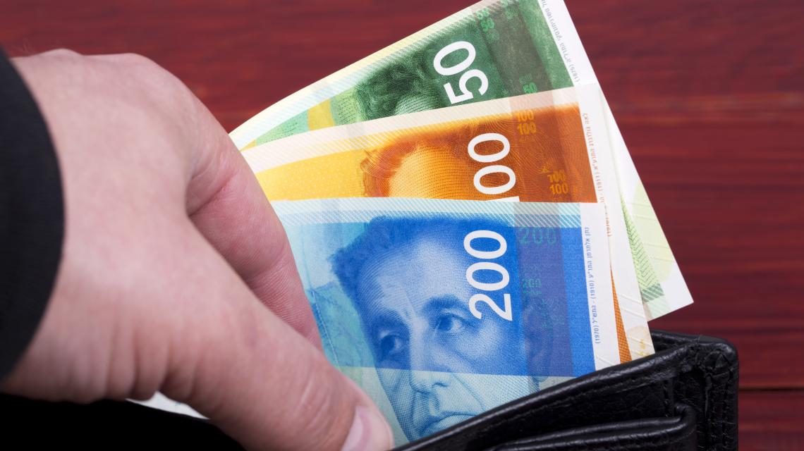 banknotes-from-israel-in-a-black-wallet-2021-09-02-23-14-10-utc.jpg