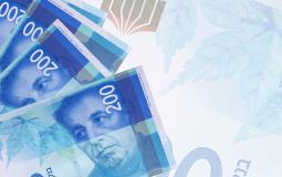 200-israeli-new-shekels-bills-lies-in-stack-on-bac-2021-08-30-04-33-31-utc.jpg