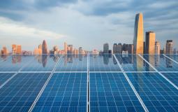 solar-energy-panel-with-city-twilight-2021-08-26-17-52-56-utc.jpg