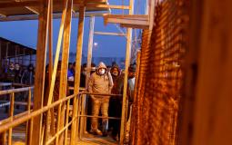 2021-03-02T092905Z_1349873128_RC2X2M9RG1O1_RTRMADP_3_HEALTH-CORONAVIRUS-ISRAEL-PALESTINIANS-WORKERS.JPG