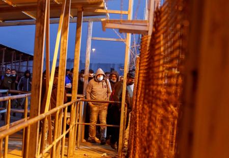2021-03-02T092905Z_1349873128_RC2X2M9RG1O1_RTRMADP_3_HEALTH-CORONAVIRUS-ISRAEL-PALESTINIANS-WORKERS.JPG