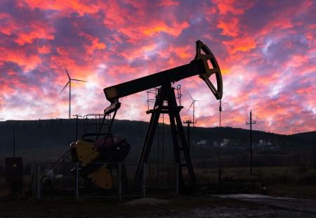oil-pump-and-wind-turbines-against-incredible-purp-2021-12-17-04-14-08-utc.jpg