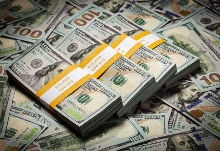 background-of-new-100-us-dollars-banknotes-bills-2021-08-26-22-58-40-utc.jpg