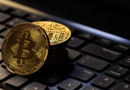 bitcoins-on-a-black-laptop-2021-08-26-16-34-02-utc.jpg