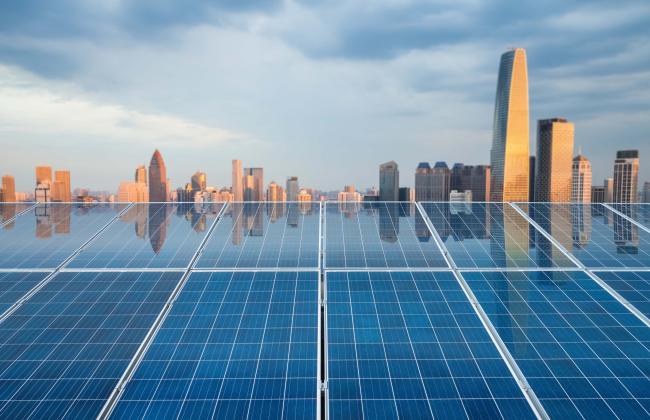 solar-energy-panel-with-city-twilight-2021-08-26-17-52-56-utc.jpg