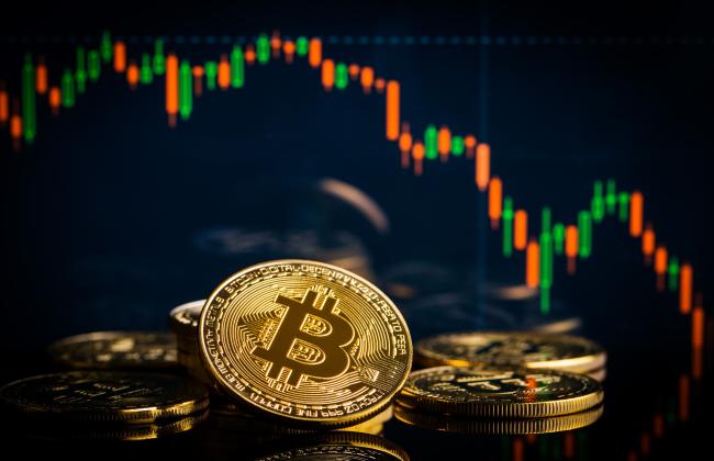 concept-with-bitcoins-and-falling-candle-graph-2021-08-26-16-24-27-utc.jpg