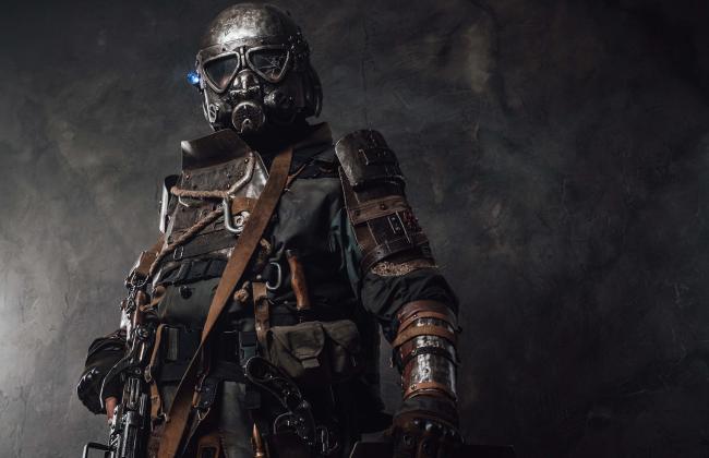 military-survivor-with-shield-and-gas-mask-in-dark-2021-09-02-06-32-10-utc.jpg
