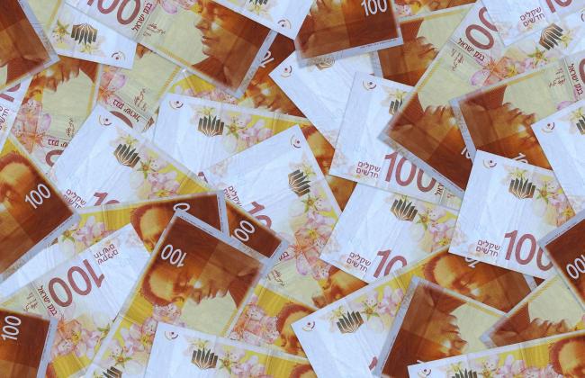 100-israeli-new-shekels-bills-lies-in-big-pile-ri-2021-08-30-04-33-30-utc.jpg