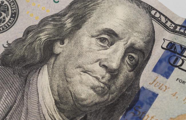dollars-closeup-benjamin-franklin-s-portrait-on-n-2021-08-26-17-11-04-utc.jpg