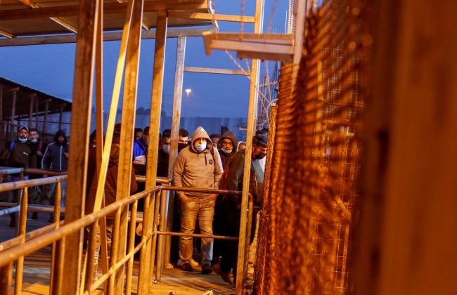 2021-03-02T092905Z_1349873128_RC2X2M9RG1O1_RTRMADP_3_HEALTH-CORONAVIRUS-ISRAEL-PALESTINIANS-WORKERS.JPG