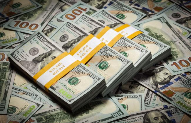 background-of-new-100-us-dollars-banknotes-bills-2021-08-26-22-58-40-utc.jpg